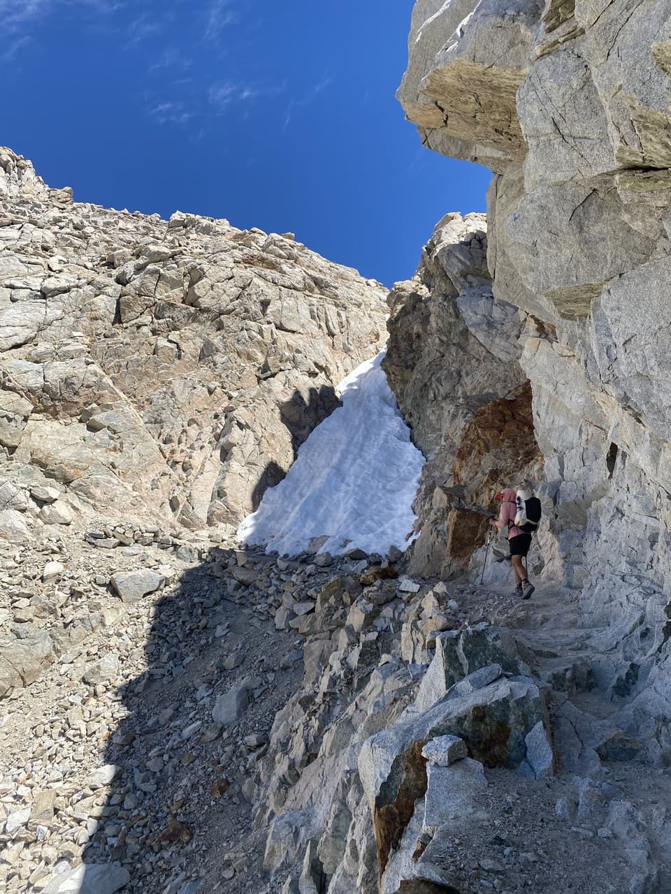 the cliff cut under the pass