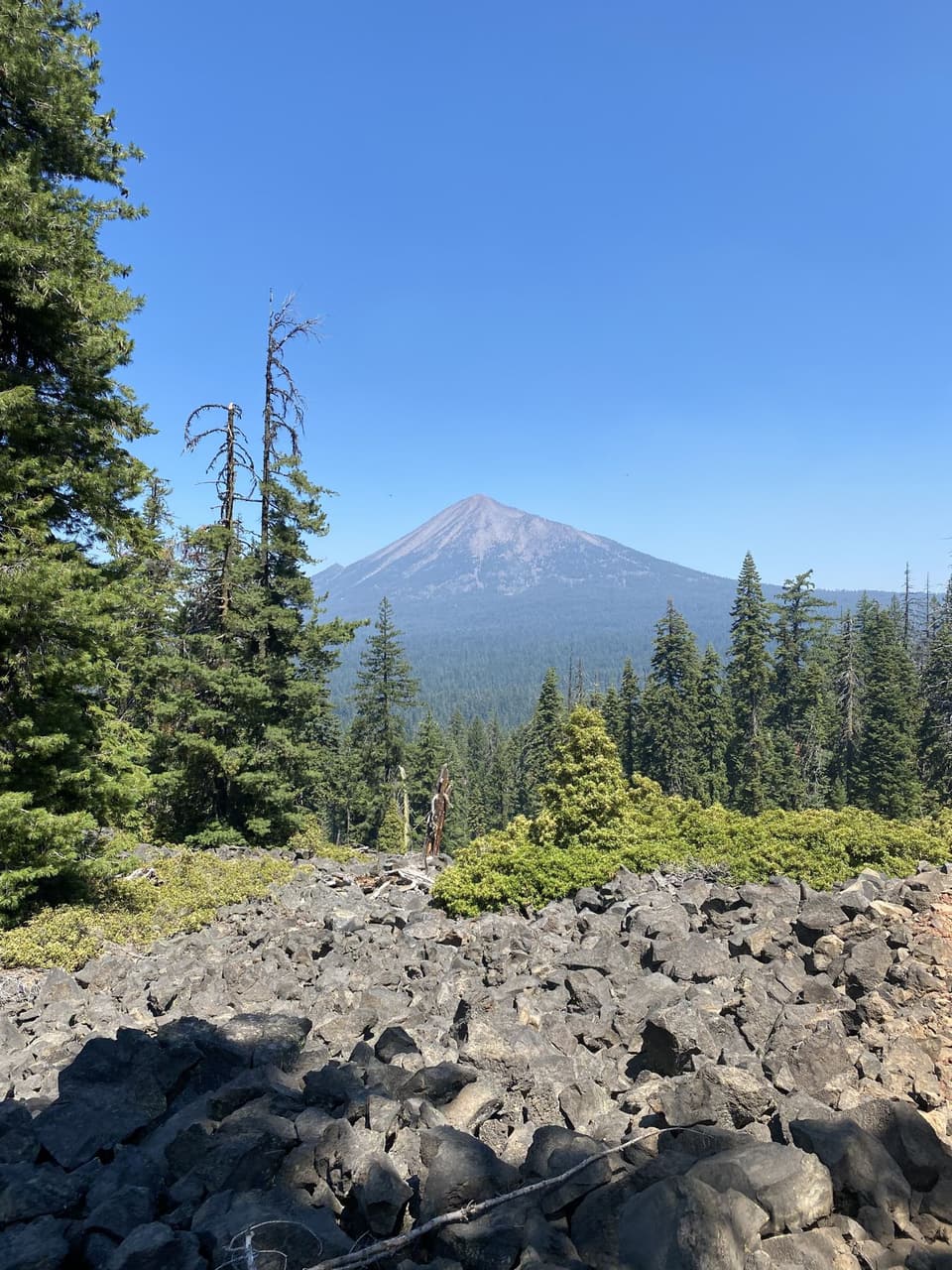 Mount McLoughlin over a lava field